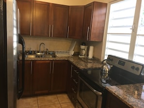 Kitchen, glass top electric stove