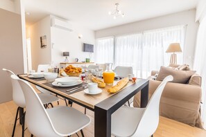 Share meals and laughs around the dining table with seating.