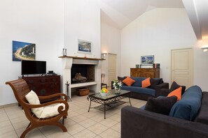 Sink into the cozy sofa after a day exploring the area.