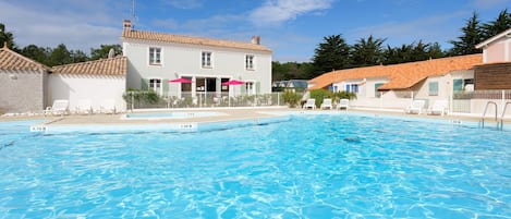 Lounge by the pool in the sunshine from June to September.