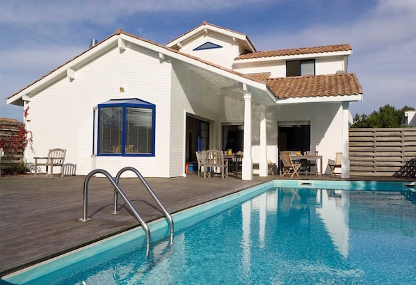 Relax by the outdoor pool.