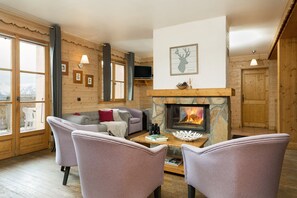 Relax in the bright living area after a wonderful day outside.