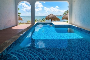 Ocean side swimming pool - La Iguana condo 4, 1 bedroom Akumal vacation rental Akumal Mexico vacation rental