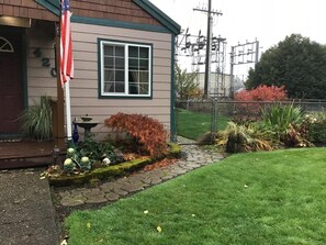 Front of house and fenced yard