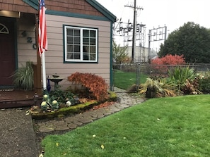 Front of house and fenced yard