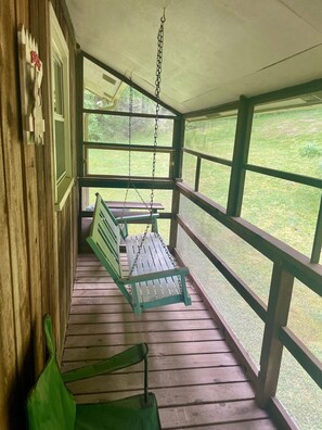 Screened in porch on the back deck to listen to the crickets