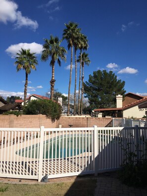 backyard pool fenced for your child's safety. 