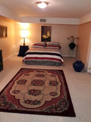 Second large bedroom with queen size bed.