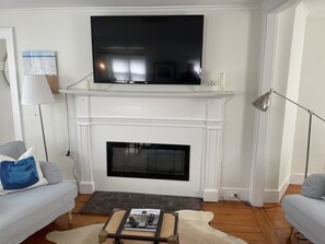 Living room TV with electric fireplace 