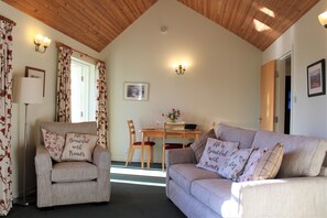 Spacious living room  with dining area Doors into conservatory WiFi  throughout