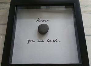 Feel the love!  This is hanging in the Master bedroom w/stone from Harbert Beach