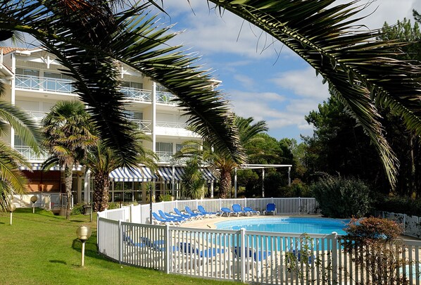 Dive into the lovely outdoor pool during the summer.