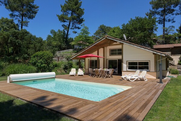 Dive into the gorgeous outdoor pool on a hot summer day.