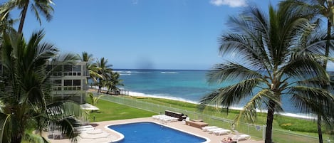 VIEW FROM YOUR PRIVATE LANAI.
Ocean, pristine salt water heated pool, BBQ shower