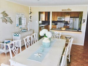 Dining room... leading into the fully stocked eat-in kitchen too