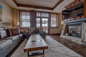 Cozy up by the fire and enjoy slopeside views of Breckenridge.