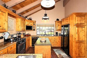 Granite kitchen with center island. 