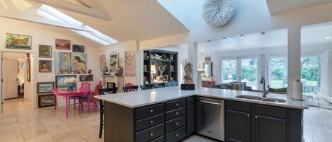 Open living space:  dining area and kitchen.