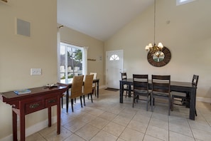 2 Tables and chairs, enough room to accommodate 10