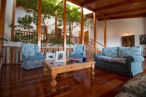 Winter living room with tree view