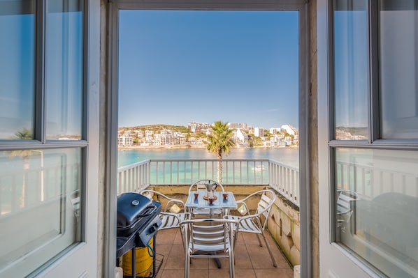 Terrace With Outdoor Furniture And Gas BBQ.