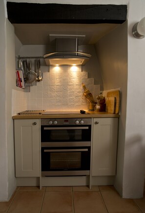 best use of old fireplace in the kitchen