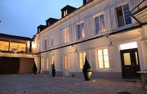 Front of property - evening/night