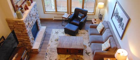 Great room view from loft. Ample seating including an American Leather couch.