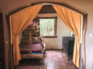 Spacious cabin features custom furniture made from sustainably sourced wood and 