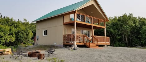 Summer at the cabin and wonderful evening relaxation by the fire pit. 