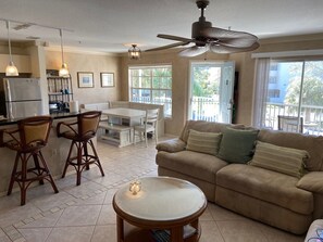 Living room, kitchen nook and lanai 