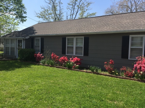 Front of the home in spring bloom. 