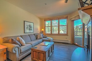 Living room in a River Run Village condo with a sofa sleeper