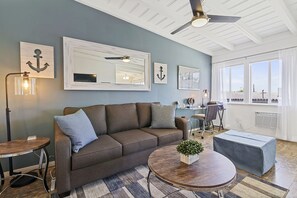 Experience the epitome of comfor and style in this modern living room.