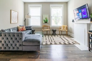 Large windows allow for plenty of natural light to illuminate the space during the day.