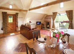 Ground floor:  Open-plan sitting area with wood burning stove