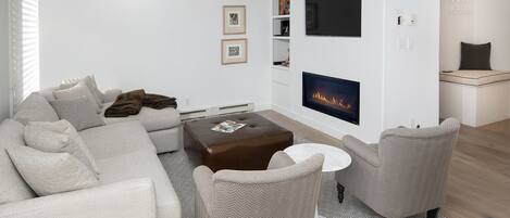Living Room w/ Fireplace & TV