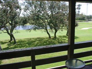 Back Porch with view Golf Course and Lake that is great for fishing!