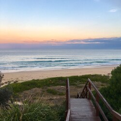 Steps down to Jemison beach at susnset
Beach can also be accessed over sand dune