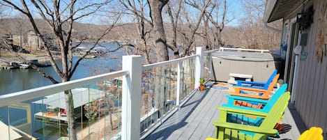 Fun new look on hot tub deck.  Relax and get some sun!  What a view!  Glass rail