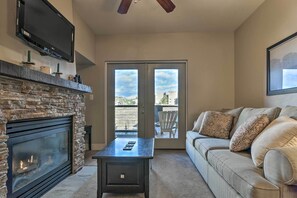 Living Room | Stone Fireplace | Cable TV