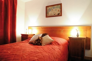 Relax on the luxurious bed after a day outside.