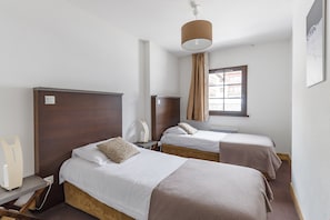 The bedroom may feature a variety of bedding options! Please let us know what you prefer.