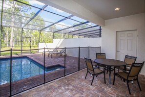 Dive into relaxation with your own screened pool—perfect for sunny afternoons or serene evenings under the stars.