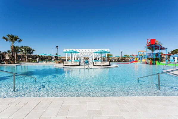 Enjoy serene pool views, contemporary design, and vibrant decor in this stunning 5-bedroom townhome.