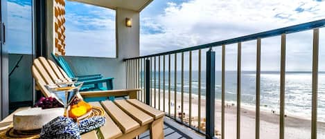 Relax and soak up the gulf front views on your private balcony