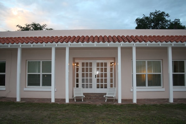 Front doors to your home away from home.  Enjoy the porch and sitting area