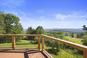 Spectacular 35-mile views may be enjoyed throughout the house & deck
