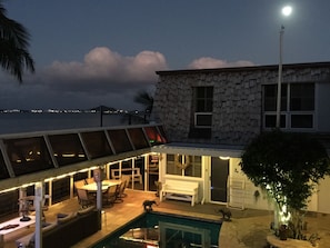 Deck and pool at dusk.