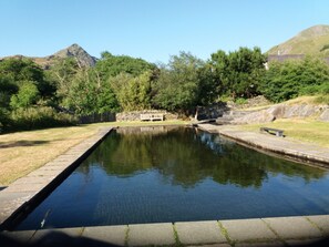 Village pool(100m away). Filled with stream water often in summer. No life guard